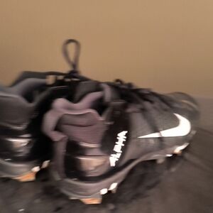 Nike Alpha Black and White Sports Cleats